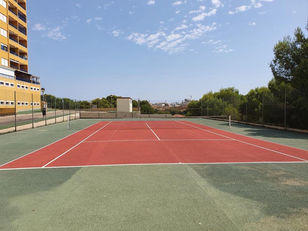 Apartment In Campoamor Overlooking The Swimming Pool Exterior foto