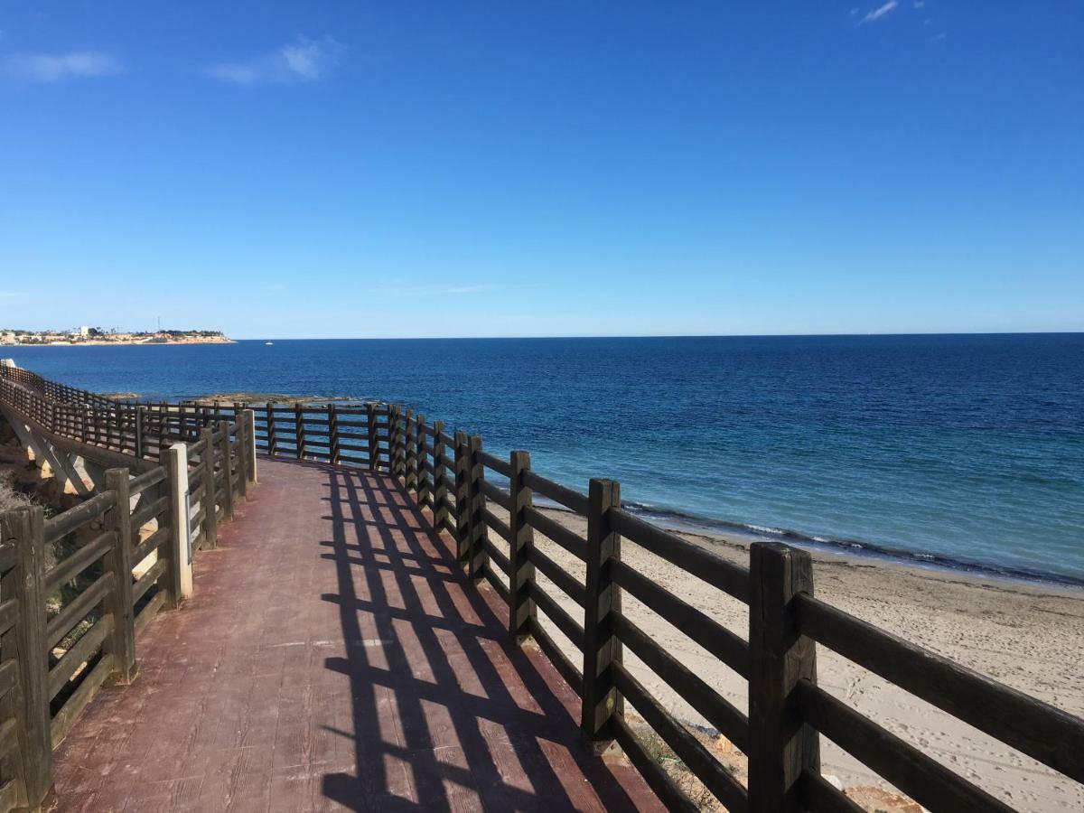 Apartment In Campoamor Overlooking The Swimming Pool Exterior foto